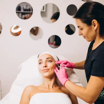 cosmetologist-making-injections-face-woman-beauty-salon